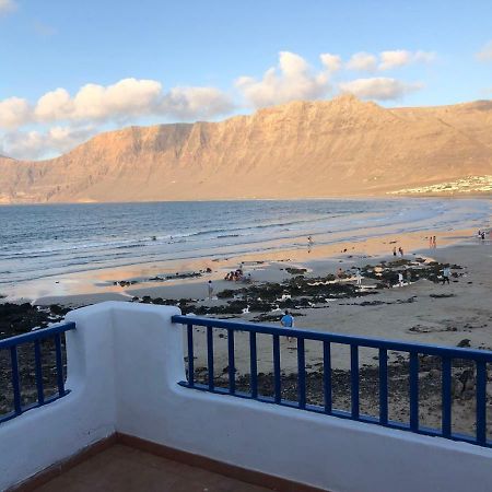 Playa de Caleta de Famara Villa Bagian luar foto