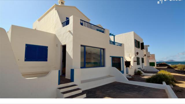 Playa de Caleta de Famara Villa Bagian luar foto