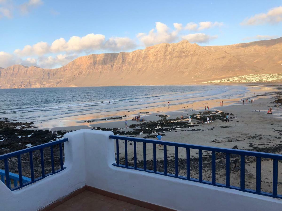 Playa de Caleta de Famara Villa Bagian luar foto