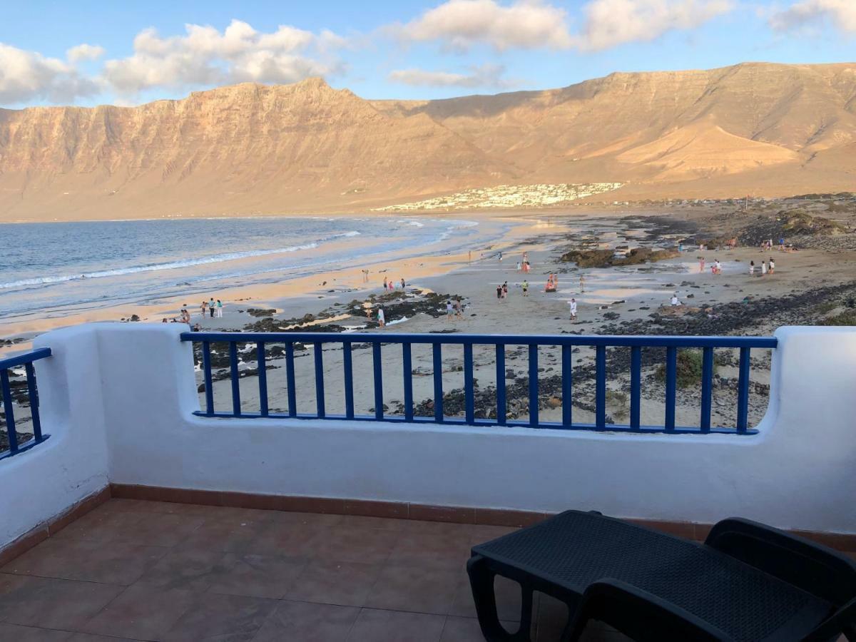 Playa de Caleta de Famara Villa Bagian luar foto